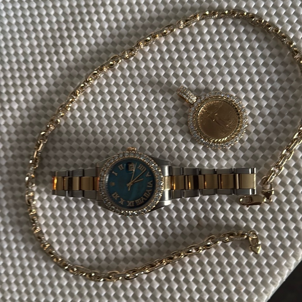 Rolex 41mm date just 
Liberty 1/2 ounce 5ct diamond bezel
81 gram diamond chain